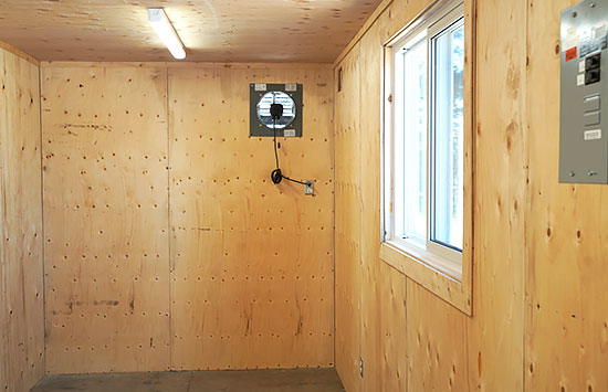 Plywood wall package in a modified shipping container - BigSteelBox