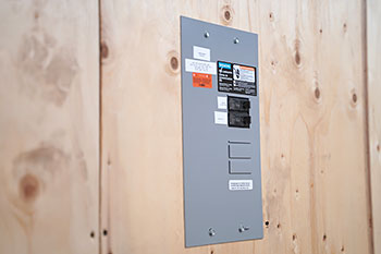 Shipping container modifications - electrical panel - BigSteelBox